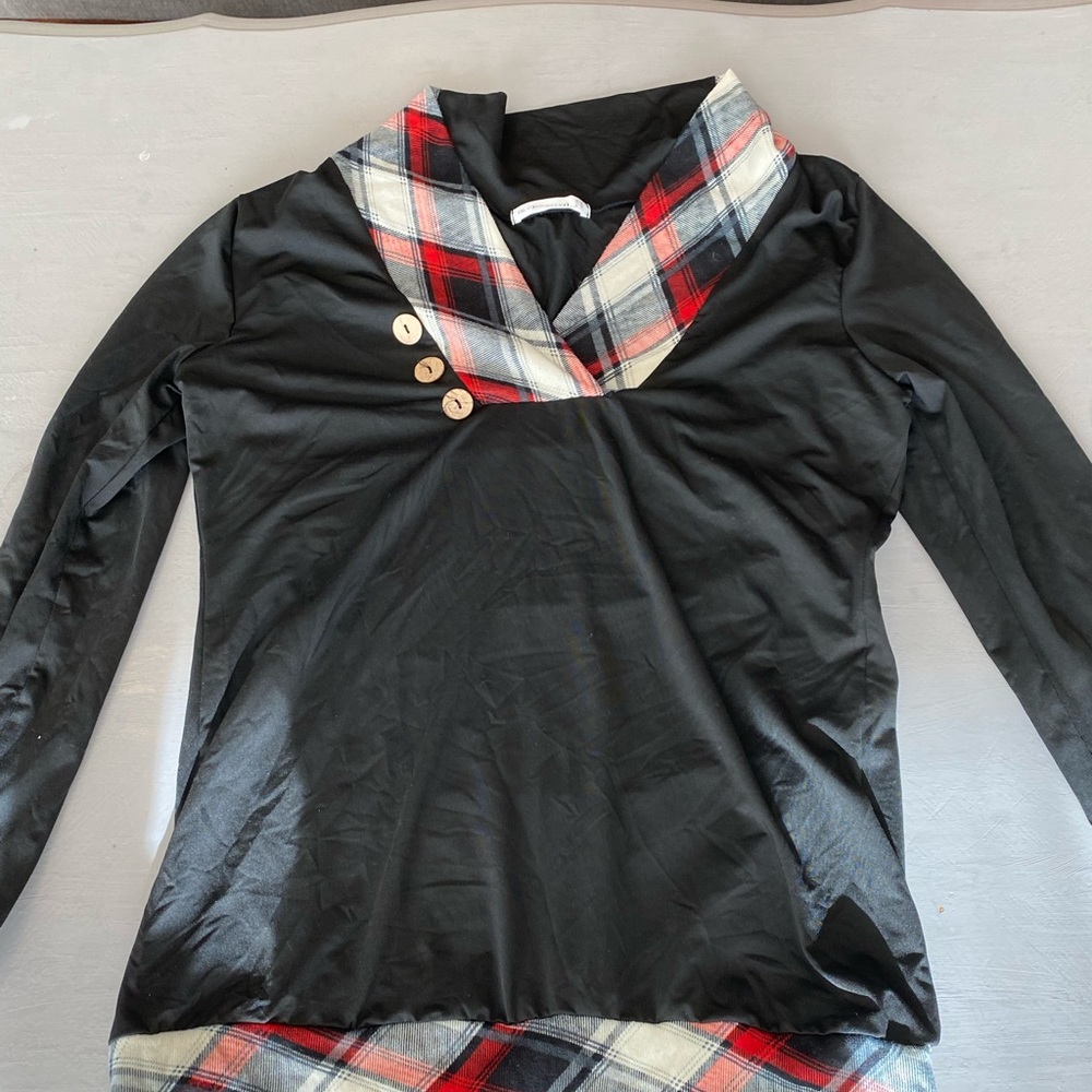 Black shirt with red flannel
